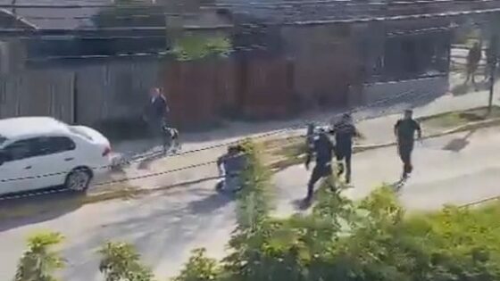 General fight in the middle of the street in some country in broad daylight Photo 0001 Video Thumb