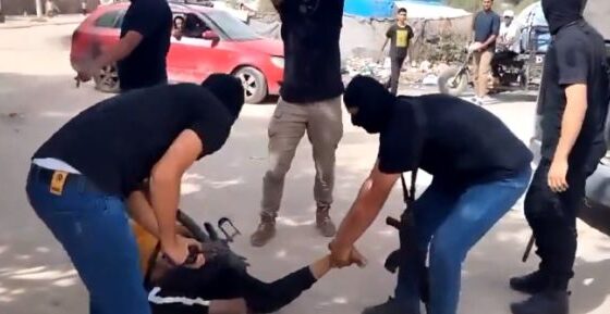 Hamas fighter breaking palestinian civilians legs for stealing Photo 0001 Video Thumb