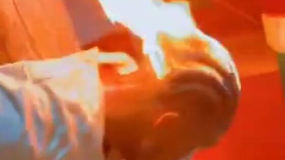 Man is tied to a pole and his hair is set on fire in haiti in terrible and brutal torture Photo 0001 Video Thumb