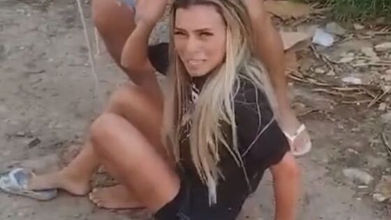 Woman punished with blows from a rubber hose for allegedly spreading lies in a favela in brazil Photo 0001 Video Thumb