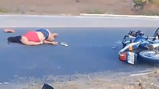 A woman is killed in a traffic accident in brazil and is left lying on the asphalt until someone removes her rotting body from the ground Photo 0001 Video Thumb