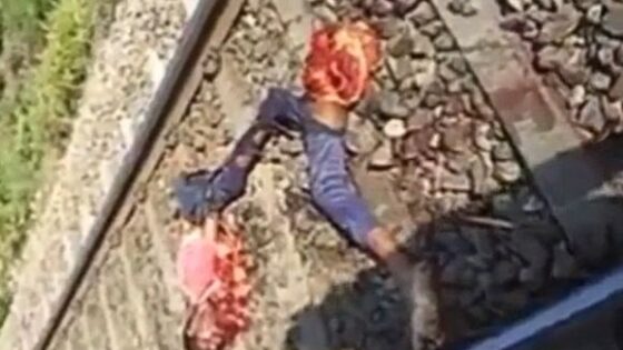 Footage of a mutilated corpse on train tracks in india Photo 0001 Video Thumb