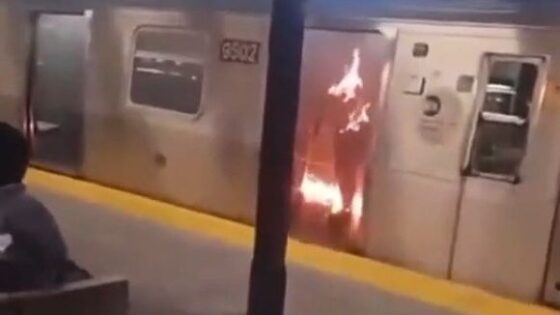 A homeless man sets fire to a woman who was sleeping on the subway and sits on a bench to watch her Photo 0001 Video Thumb
