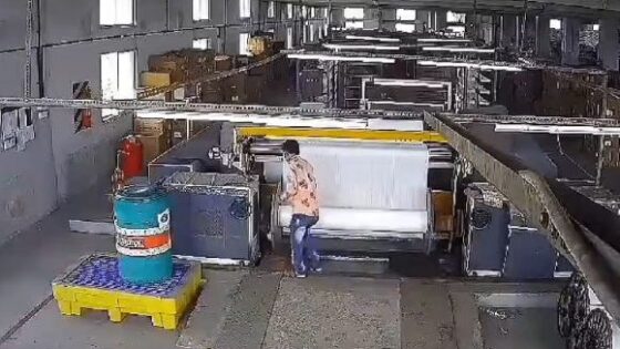Factory worker gets wrapped up to his guts in the rotating press Photo 0001 Video Thumb