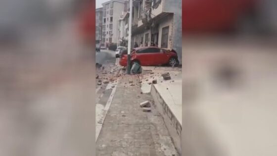 Car smashed through wall fly to opposite street Photo 0001 Video Thumb