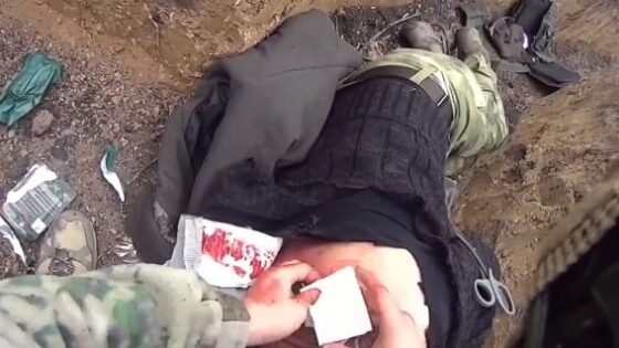 Last moments of a russian medic and his wounded comrade Photo 0001 Video Thumb