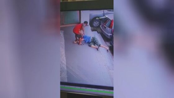 Man tries to kill woman by stabbing her in the chest on the sidewalk in some asian country Photo 0001 Video Thumb