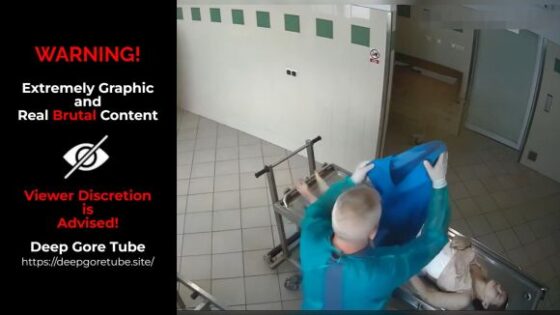 Dead young woman being dressed at morgue Photo 0001 Video Thumb