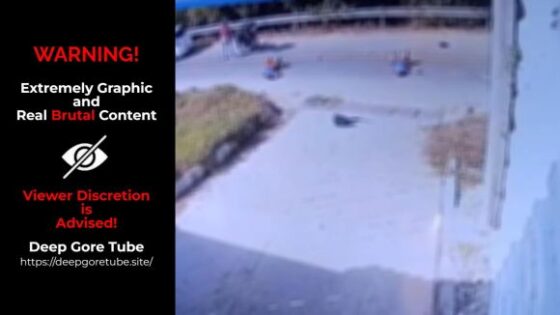 Horrific head on collision between motorcycle and car is captured on security camera in colombia Photo 0001 Video Thumb