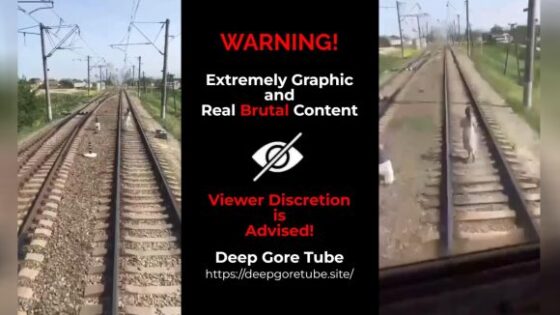 Woman hit by train doesnt even look back to avoid seeing death approaching Photo 0001 Video Thumb