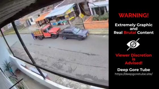 Motorcyclist seriously injured after crashing into parked truck in Colombia Photo 0001 Video Thumb
