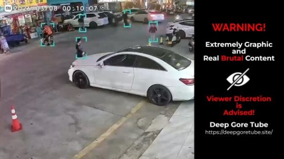 Child trapped under SUV wheels in China Photo 0001 Video Thumb