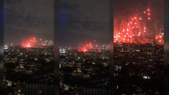 Red flares fall over Wapping in London UK Photo 0001 Video Thumb