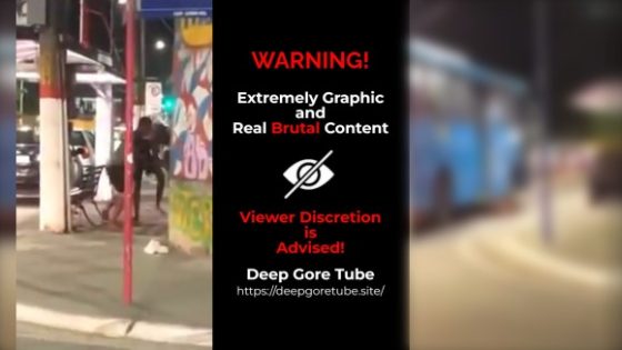 Guy loses fight so he pushes guy in to a moving bus Photo 0001 Video Thumb